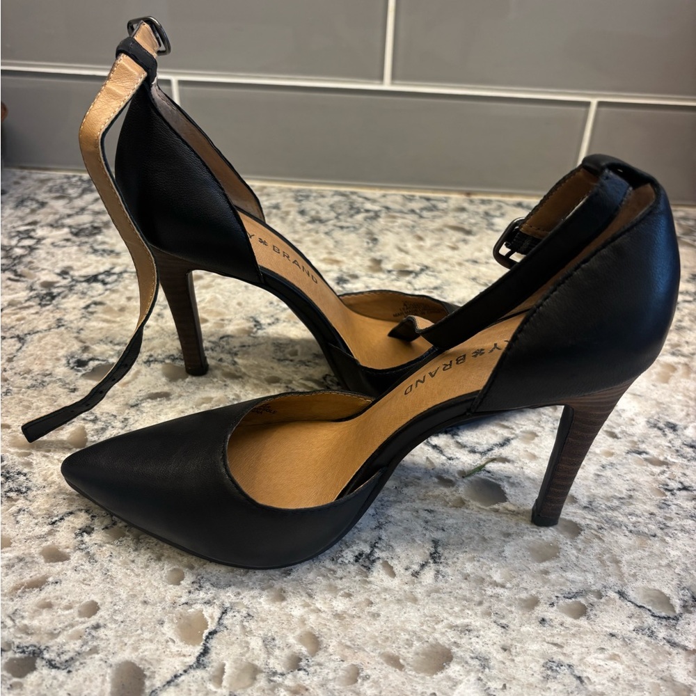 Black Heels with Ankle Strap by Lucky only worn a few times excellent combo